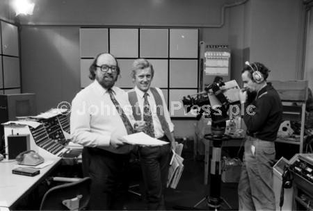 22562542-Neville Garden and Malcolm Wilson, presenters of BBC Scotland s news programme Good Morning Scotland with their cameraman in the Edinburgh