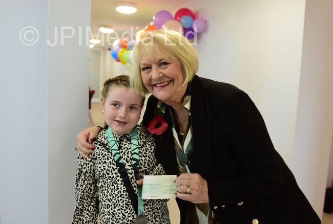 395990587yearold Anya Amer, of Halesworth Drive, Sunderland, presenting a cheque to the