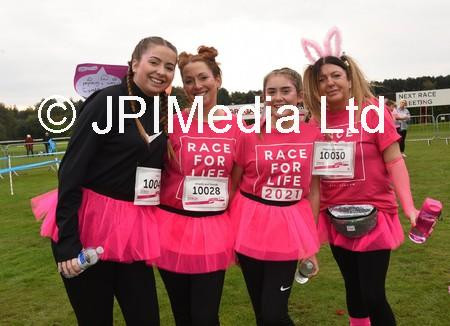 39199715-WIGAN 17-10-21 Action from the annual Cancer Research Race for Life event at Haydock Park fund raisers could run, jog or walk the