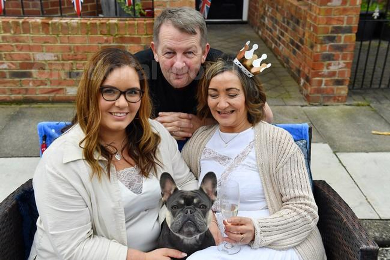 39709017 The Atkinson Family with their dog Bella during the celebration of the Coronation of King Charles at Arncliffe Gardens Hartlepool. Picture