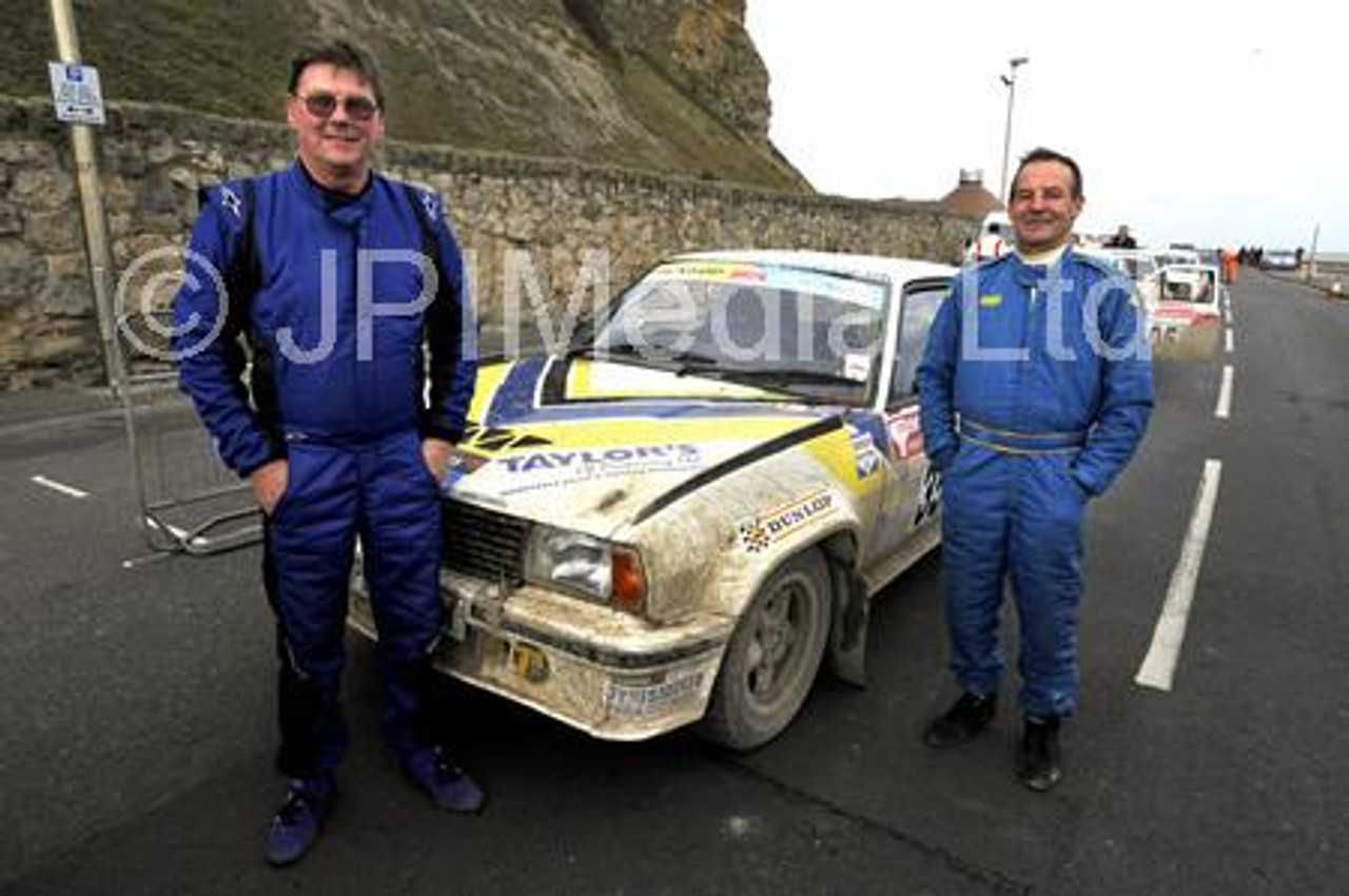 38592258 Pickering team of Steve Magson L and co Geoff Atkinson with their Opel Ascona 400 as The Trackrod Historic Cup Rally starts from the Toll