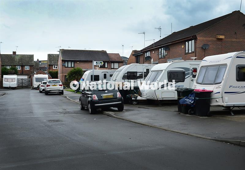 39909112Catcliffe residents are living in caravans after the October