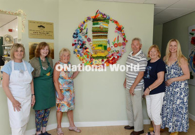 40352107-A new piece of textile artwork produced by groups, visitors ...