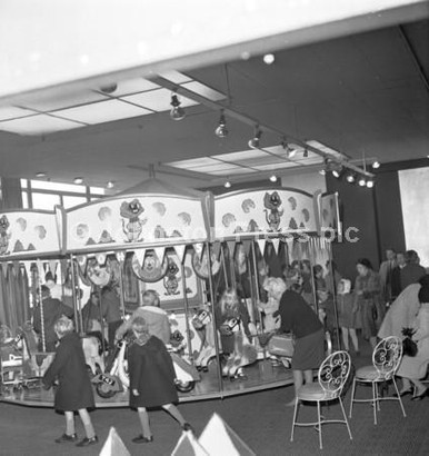 20367716-The funfair roundabout inside Goldbergs department store in ...