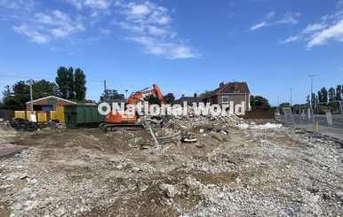 39827366-The demolition is underway at the site of a former car wash ...