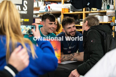 39951291-Jamie Boyle and Nathan Peers speak with a fan as band The K's ...