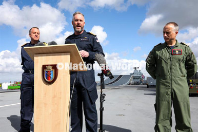 40277029-From left, Captain Will Blackett RN, Commanding Officer of HMS ...