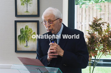 40328426-Lakeside resident Ken Sumner, read a poem by William ...