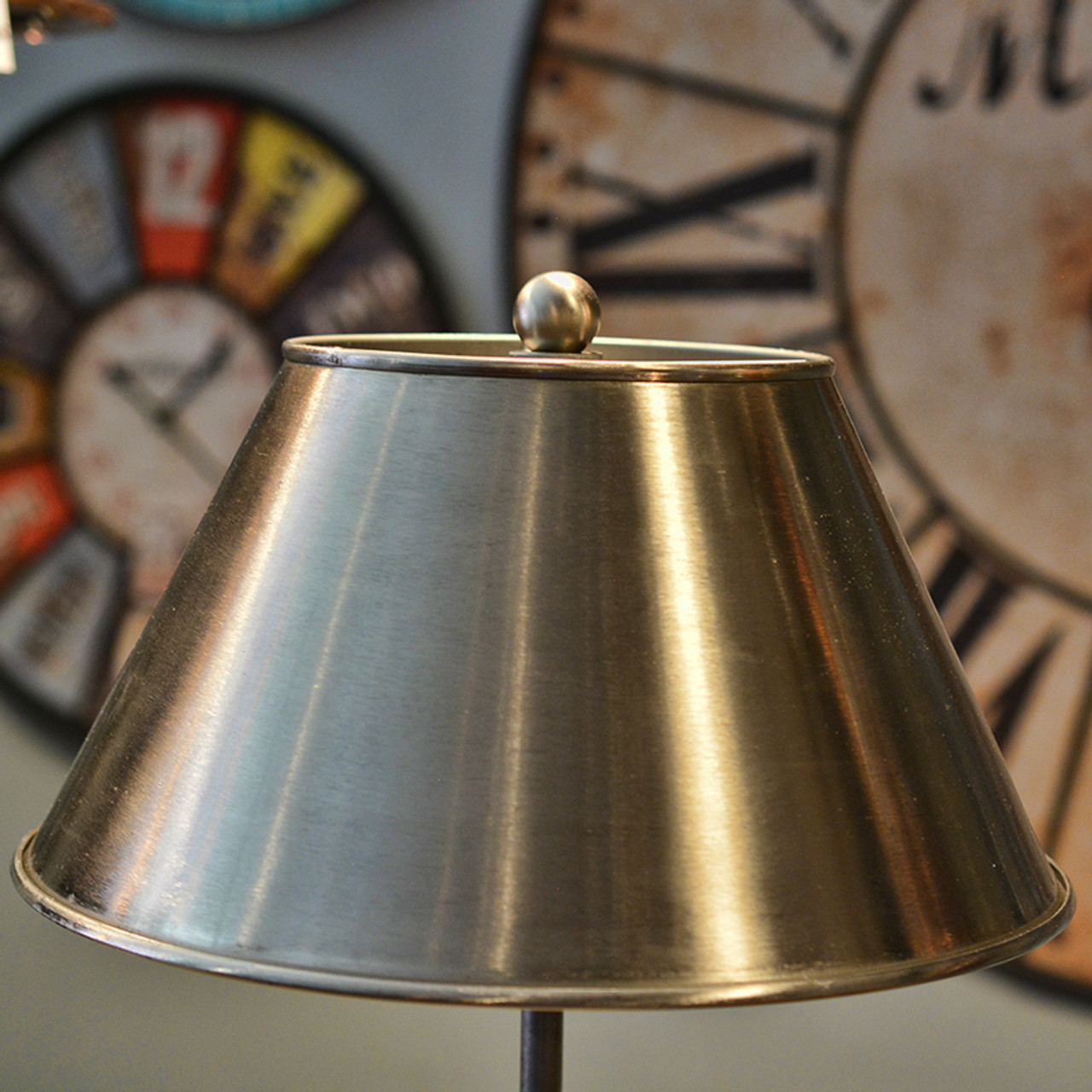 silver and gold lamp