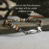 IN-555  Peacekeepers Bracelet--designed in reflection of our world in need of Prayer and Peace.  Let's be Peacekeepers.