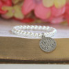 RH-62-5  Glass Pearls Stretchy 5" bracelet with Vintage St. Benedict Medal in Rhodium for Baby