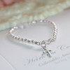 STG-75CR Sterling Silver Cross and Faceted white Glass Pearls Oh so Precious 5" Infant Bracelet