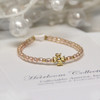 CJ-437  Blush Baby Fancy Cross 5" Pearl Bracelet