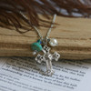 DD-6 Cross with pearl and Turqouise glass bead