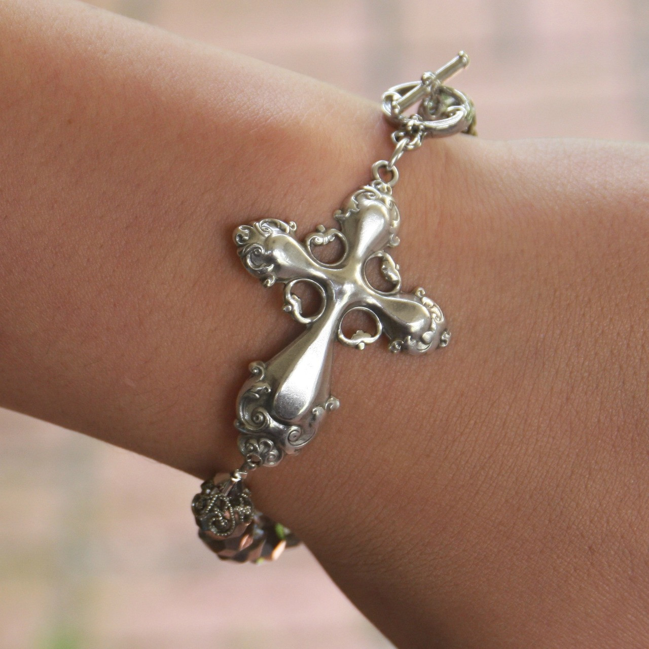 BR-12  Gorgeous Cross and Platinum Beaded Bracelet with Toggle