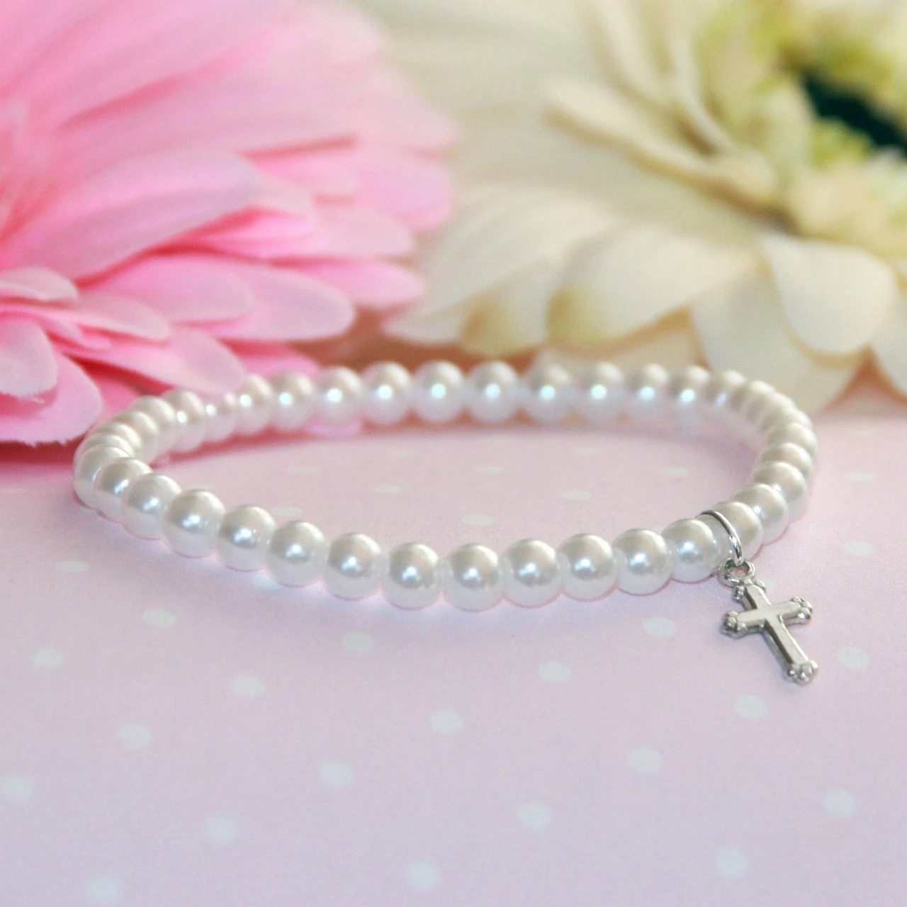 CJ-5036  Stretchy 6" Top Selling Glass Pearl Bracelet with Rhodium Cross