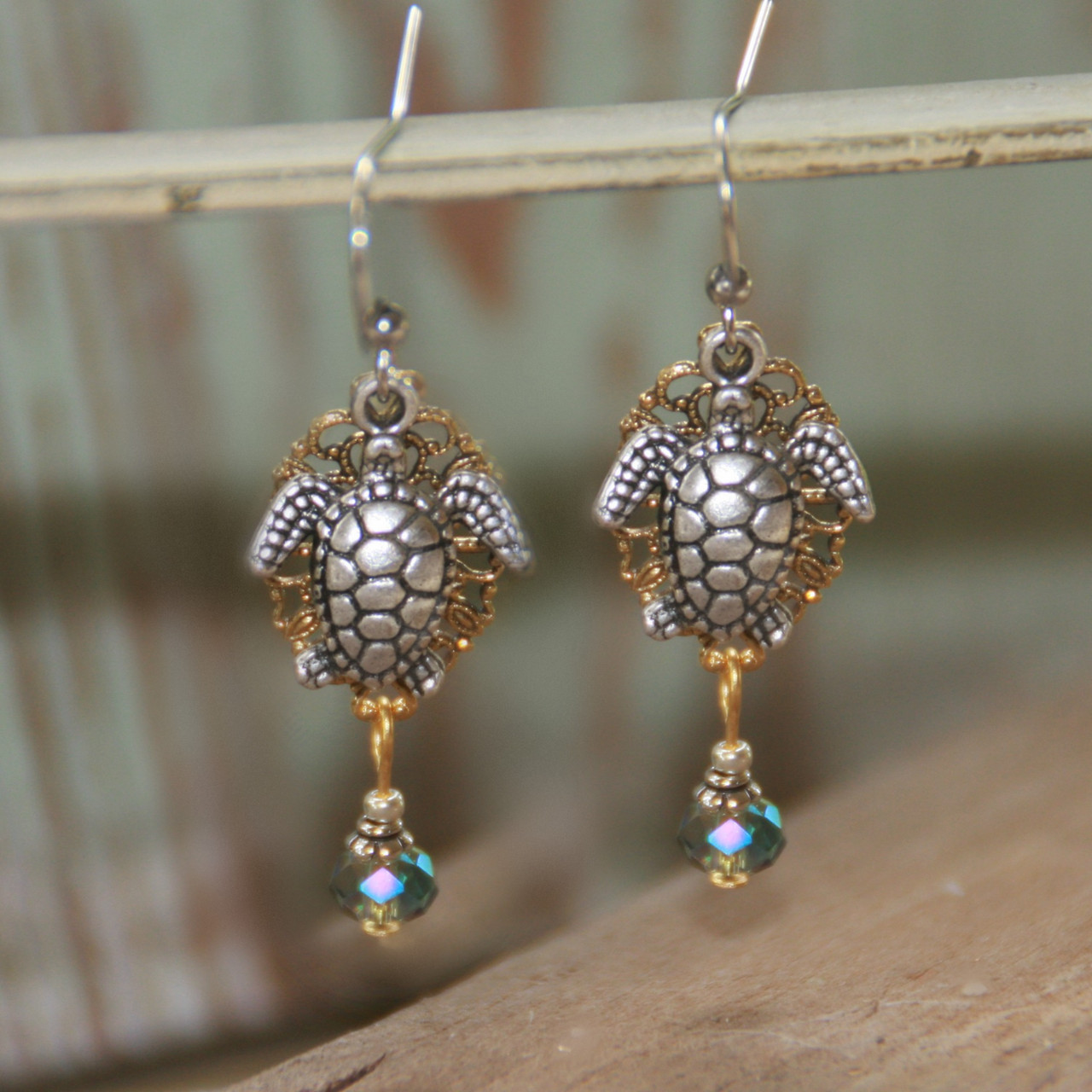 OC-19  Filagree background Layered Seaturle Earrings