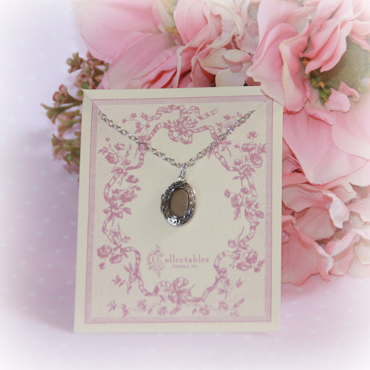 RH-15  Medium Oval Rhodium Locket with Engravable center