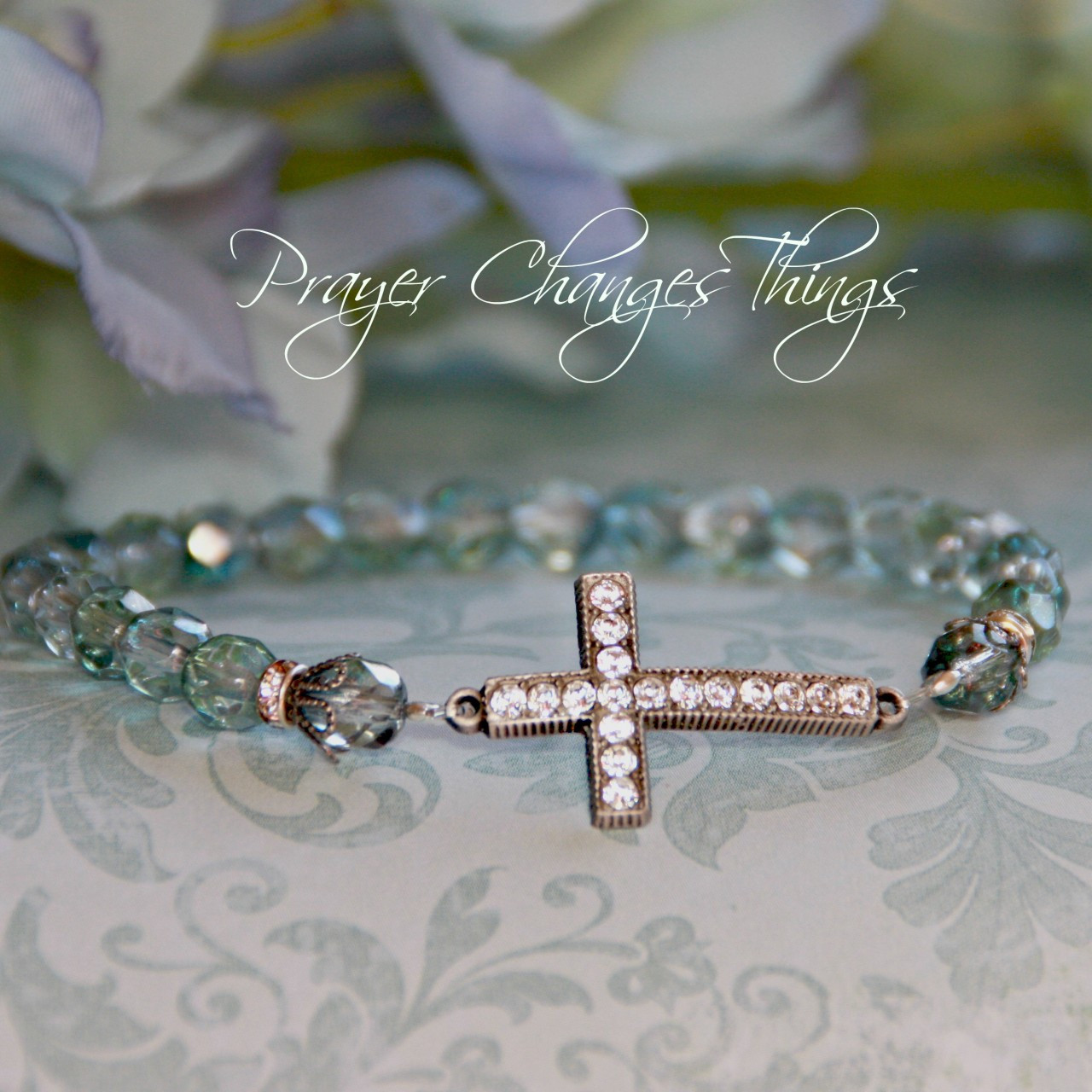 IN-104 Aquamarine Jeweled Cross Bracelet