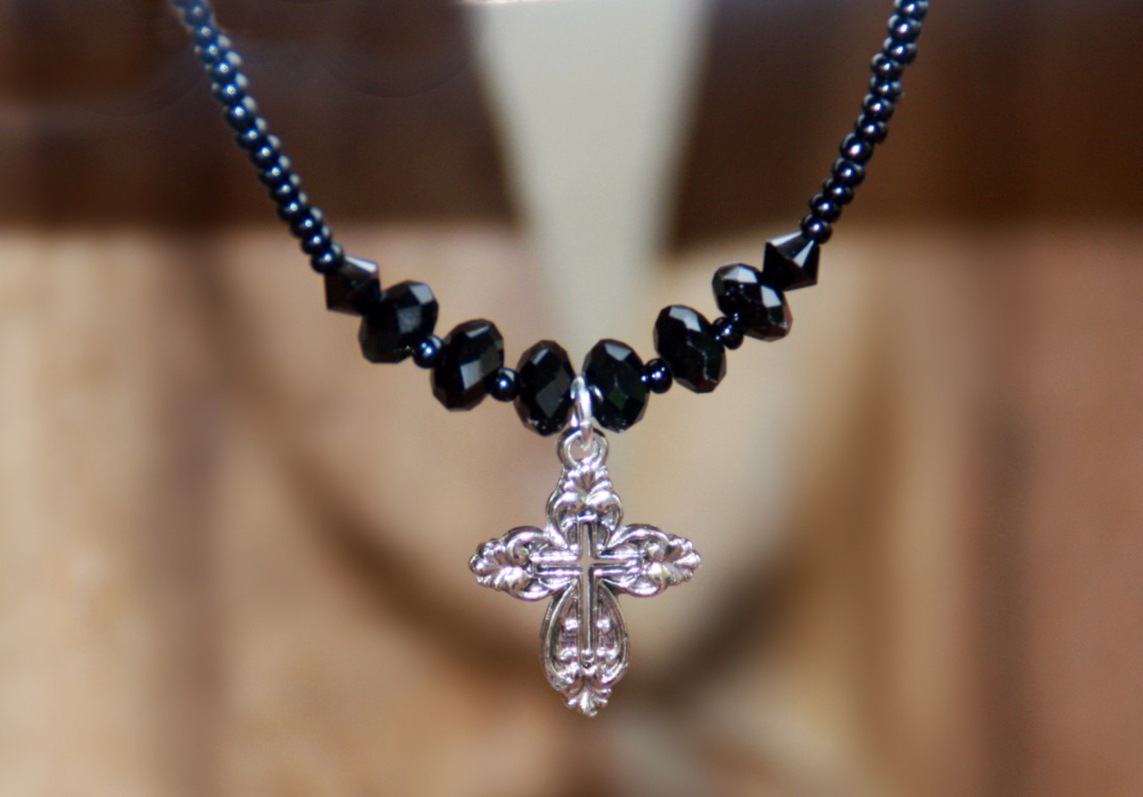 IN-618 Silvertone Cross Black beaded necklace