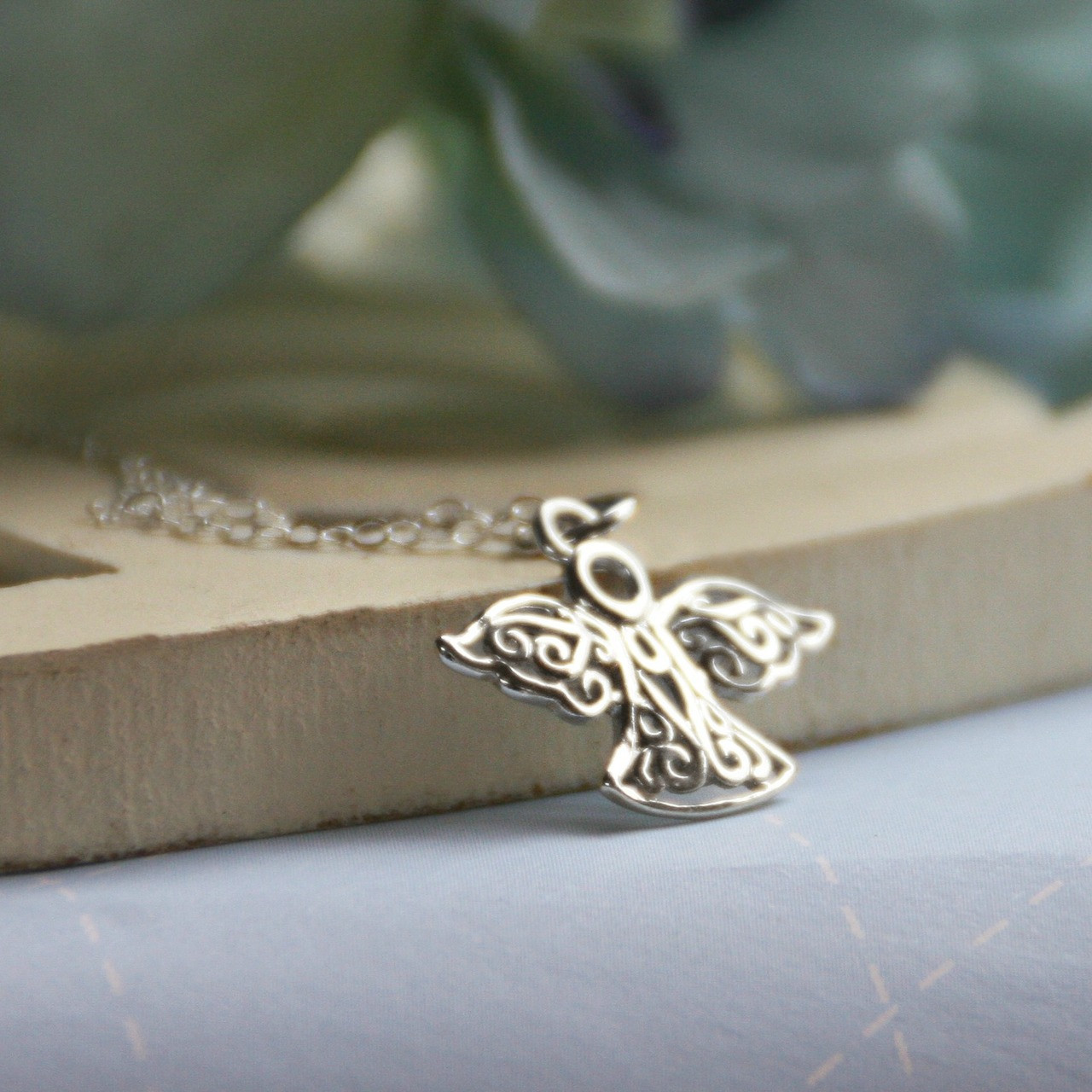 STG-36  Sterling Silver Angel Charm with 16" chain