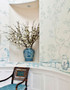 Porcelains White, printed mural wallpaper by Paul Montgomery. White chinoiserie in room.