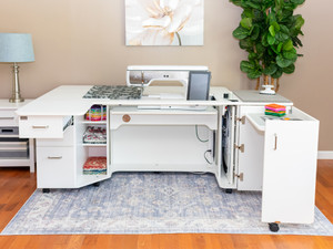 Horn of America Model 9090 Sewing Cabinet featuring a spacious 34" x 15½" machine cut-out, swing-up table, embroidery hoop pull-out, and soft-close drawers. Horn of America Model 9090 Sewing Cabinet featuring a spacious 34" x 15½" machine cut-out, swing-up table, embroidery hoop pull-out, and soft-close drawers.