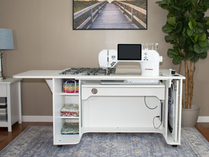 The Horn Model 9030 Sewing Cabinet offers a 34" x 15½" machine cut-out, swing-up table, embroidery hoop pull-out, and adjustable shelf space The Horn Model 9030 Sewing Cabinet offers a 34" x 15½" machine cut-out, swing-up table, embroidery hoop pull-out, and adjustable shelf space
