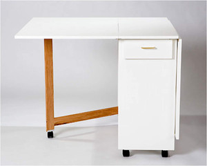 The Tracey Stables Standard Cutting Table offers a spacious 72" x 40" workspace, 1 drawer, and a storage area, with customizable height and color options. The Tracey Stables Standard Cutting Table offers a spacious 72" x 40" workspace, 1 drawer, and a storage area, with customizable height and color options.