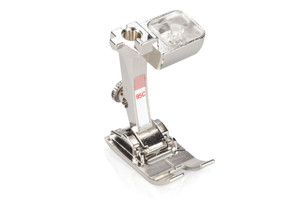 The special design of this presser foot supports and facilitates sewing with Binder Attachment #87 and #88. Binder Foot #95C enables you to create neat, even edge finishes on quilts, home furnishings and garments, so both simple and elaborate sewing projects are successfully completed in no time flat. The special design of this presser foot supports and facilitates sewing with Binder Attachment #87 and #88. Binder Foot #95C enables you to create neat, even edge finishes on quilts, home furnishings and garments, so both simple and elaborate sewing projects are successfully completed in no time flat.