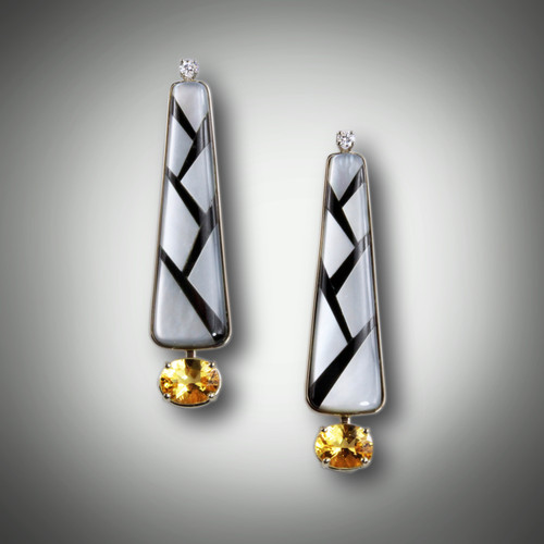 ER 192 have hand carved mother of Pearl and black jade inlay earrings with a 10 point white diamond on top and a 2ct citrine on the bottom set in 14kt yellow gold. Width is .5 inches and the earrings are 2.5 inches long.