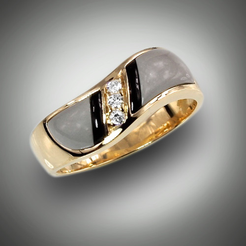 R 98-711 has hand carved grey jasper and black jade with 3 F/VS pave` diamonds set in 14kt yellow gold.