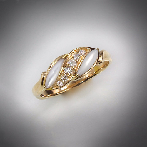 R-193 sweetheart ring with hand carved mother of pearl and .12twt F/VS pave` diamonds set in 14kt yellow gold.