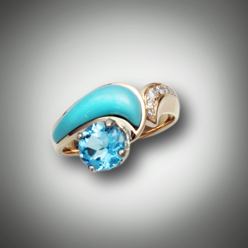 R-790 Companion is set with a 7.0mm swiss blue topaz with 7 F/VS pave` diamonds and turquoise inlay set in 14kt yellow gold. 