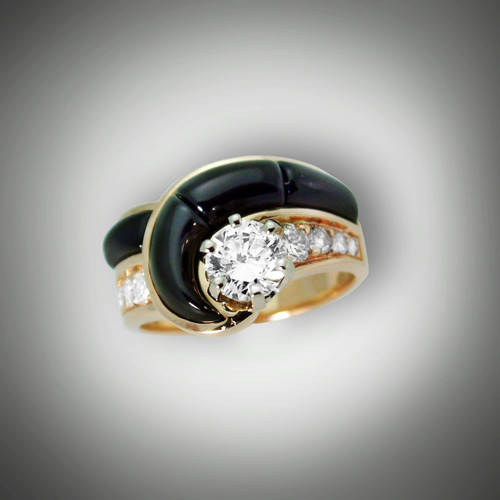 R 255 with a 1 ct round diamond and hand carved black jade as the inlay stones.
