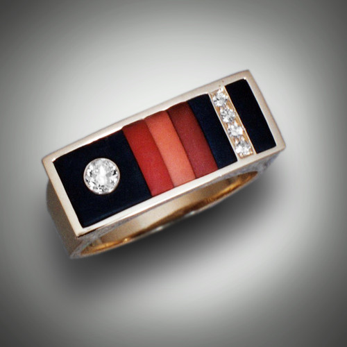 R 776 Has Diamonds and Sueded Black Jade and Jaspers set in 14k Yellow Gold.