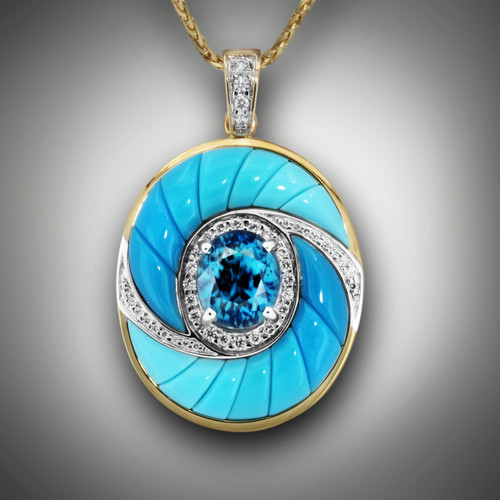 PND ER 108 A lovely pendant featuring a 9.5X8mm oval Blue Zircon, 41 LGD pavè diamonds and 14 pieces of 7 gradated shades of blue turquoise set in 14kt yellow gold.