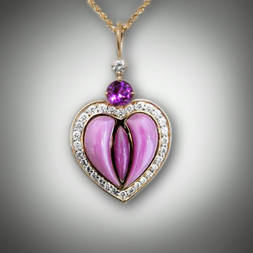 PND 264 has a round purple amethyst gem stone and 30 pave` F/VS diamonds, with hand sculpted phosphosiderite inlay stones. 