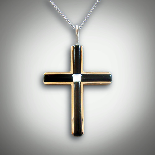 Pnd 144 with one piece of mother of pearl for the center and black jade for the rest set in 14kt yellow gold.