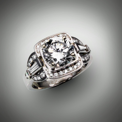 R 946 has a 8.5mm renzite stone with 1.48 points of F/VS pave` diamonds set in 14kt white gold.