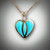 Pnd 176 heart features a .05 ct Round Diamond and three sculpted pieces of Turquoise.  You can change the diamond size or change the inlay stones to Mother of Pearl, or black jade.  