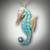 PND 393 Seahorse with various shades of turquoise from the Sleeping Beauty Mine with 129 pave` F/VS diamonds and a .25ct diamond in the tip of the tail.