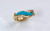 R 186 has hand carved turquoise with 6 F/VS pave` diamonds set in 14kt yellow gold.  This ring also looks beautiful with other color stones too.