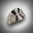 R 717 has black jade inlay instead of mother of pearl set in 14kt white gold.