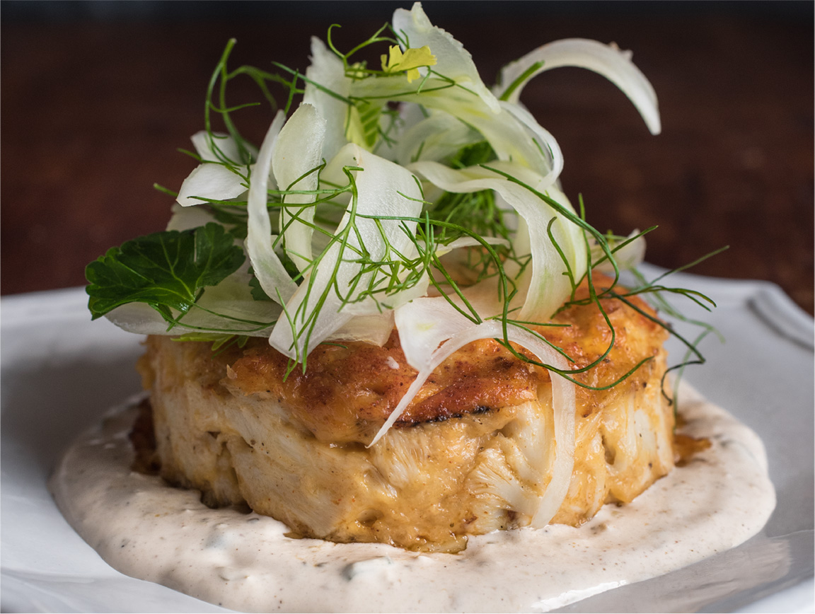 Room for two? Save space for our favourite duo: the Jumbo Lump Crab Cakes.  Two East coast-inspired crab cakes, served with a fresh fennel…