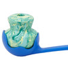 Shown in ball thrower the Ruffwear Toadstool Dog Toy – Durable treat-dispensing toy for dogs.