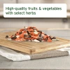 Dried carrot, pea and alfalfa flakes with apple and banana pieces from the AniForte BARF mix