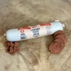 Goat pâté for dogs sliced from the roll