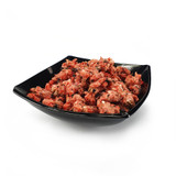 The RAW Factory Pork & Tripe raw dog food, showing the food served in a bowl from the side