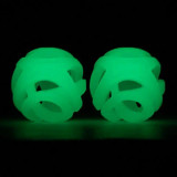 Chuckit Air Glow Ball small size pack of two glowing fetch balls shown glowing in dark